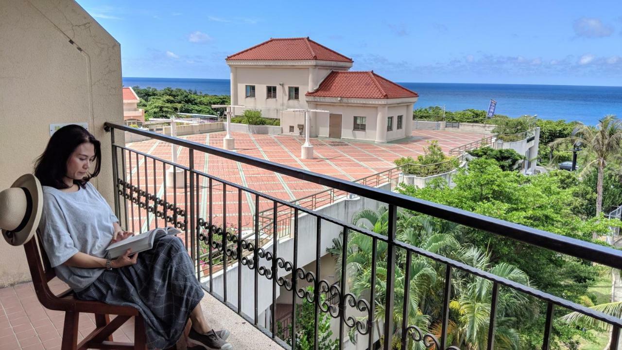 Howard Beach Resort Кэньдин Экстерьер фото A balcony in Okinawa, Japan